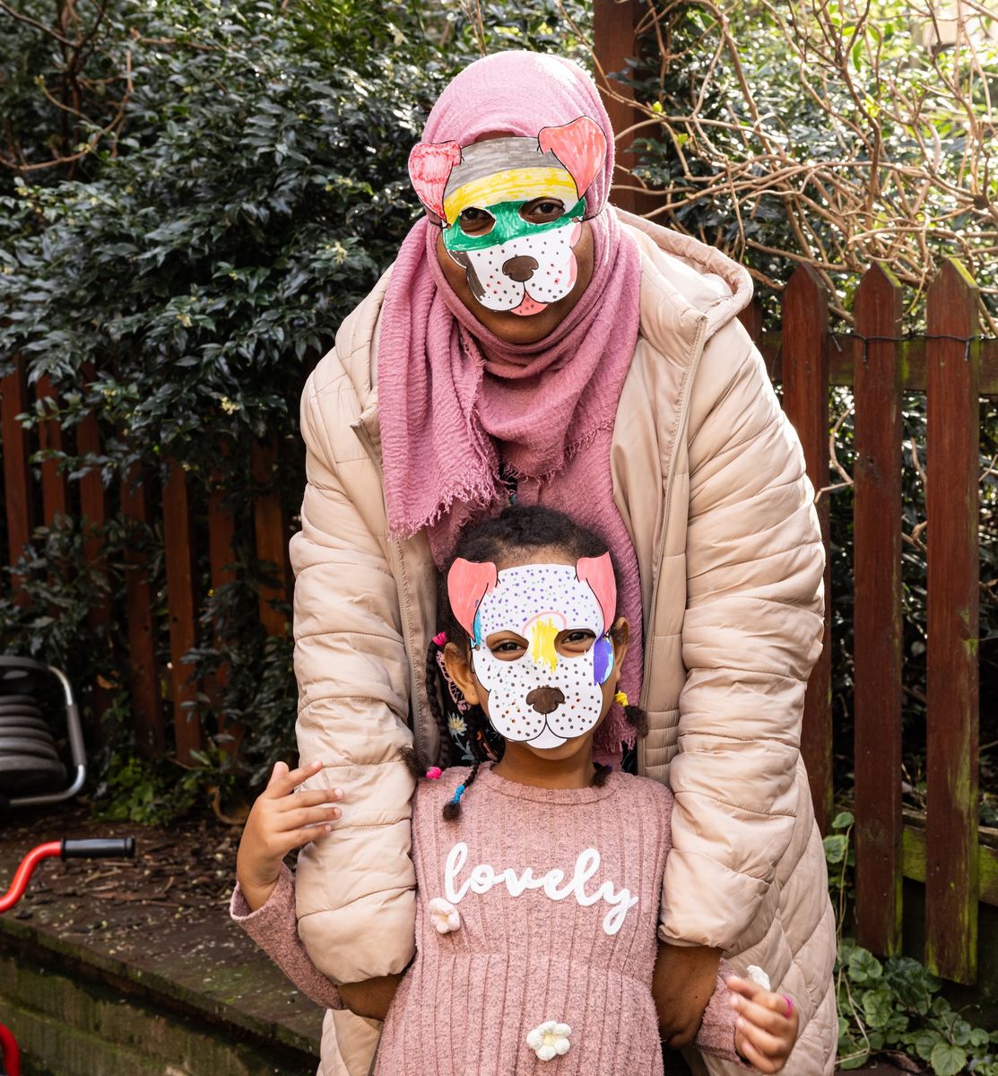 Mother and child wearing masks
