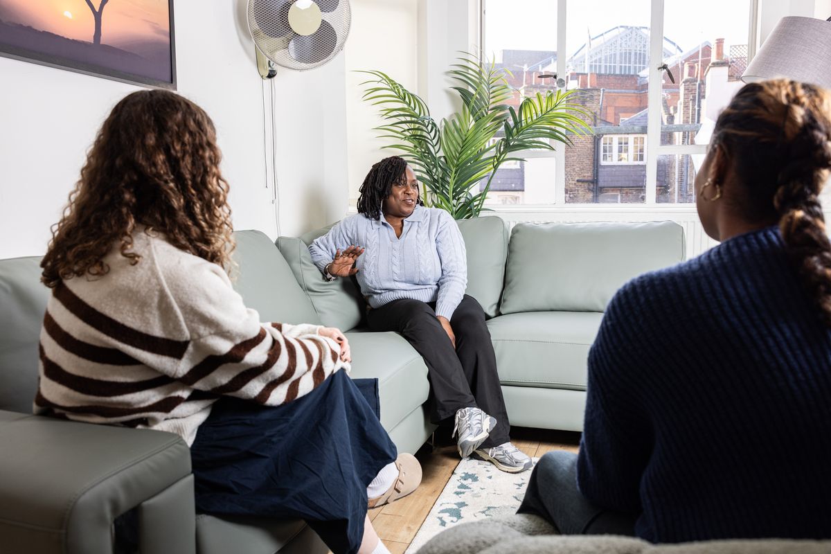 Hostel manager with residents