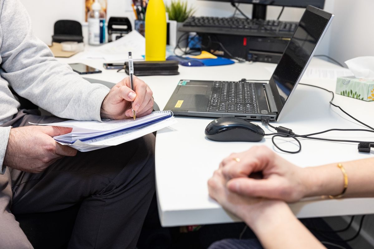 Client's hands with advisor