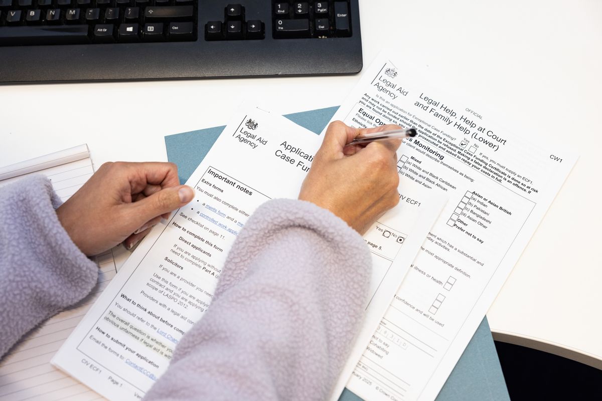 Immigration advisor filling out form