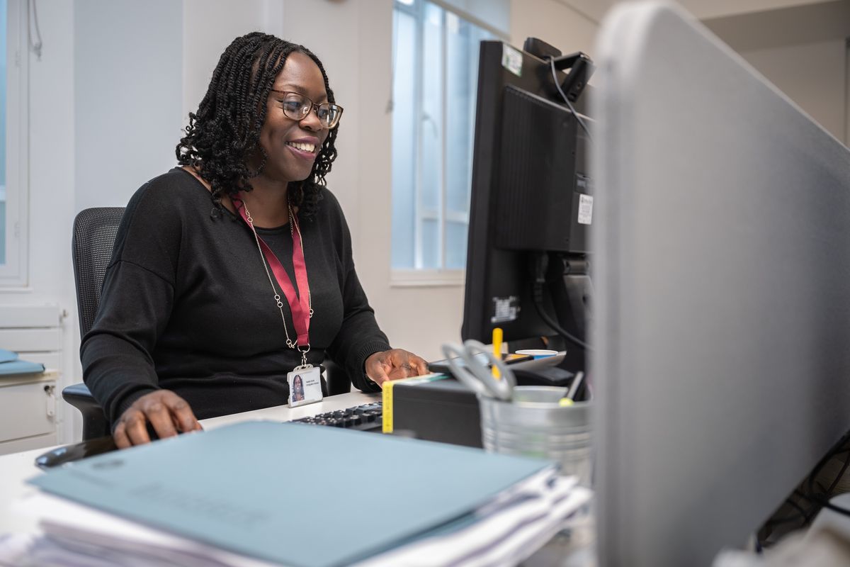 Immigration adviser at a desk